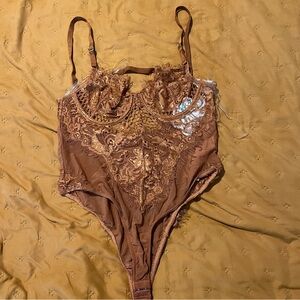 Orange lacy bodysuit